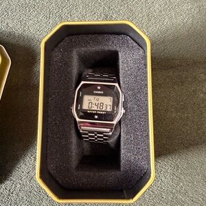 Casio Black and Silver Digital Timepiece